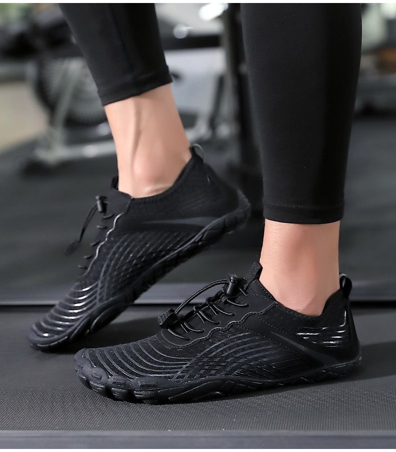 Nuove scarpe da nuoto Scarpe da spiaggia per esterni Scarpe da acqua per coppie Scarpe ad asciugatura rapida a piedi nudi Scarpe da acqua per lo snorkeling Scarpe da trampolino_voghion.com