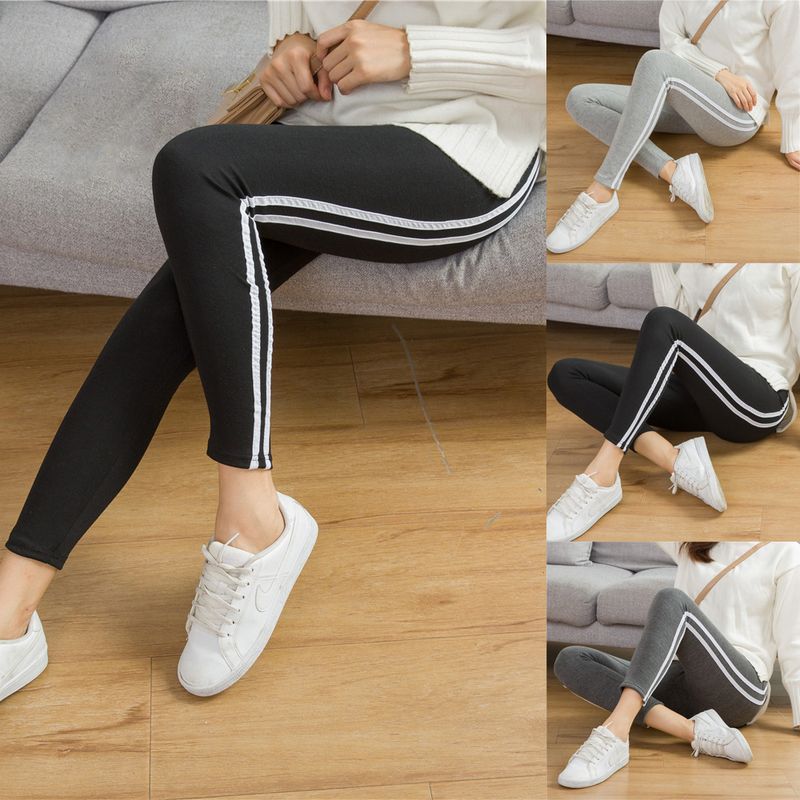 Pantalons pour femmes avec petites jambes, leggings slim à rayures latérales à neuf points_voghion.com