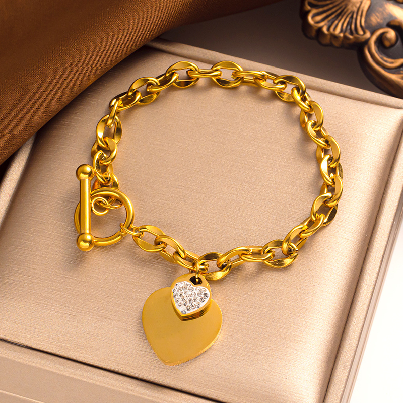 Semplice cuore di pesca Bracciale in acciaio al titanio con oro Anello con lettera Bracciale con fibbia a forma di T Bracciale in acciaio inossidabile a forma di cuore_voghion.com