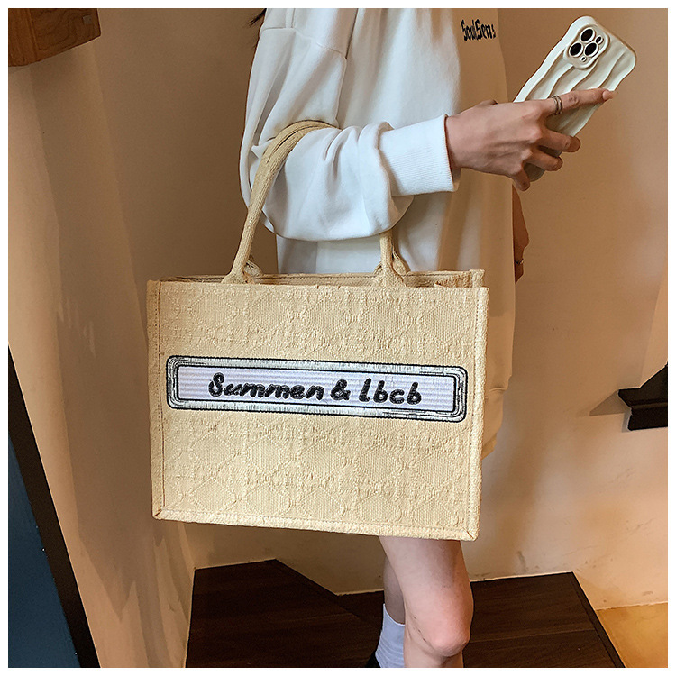 Baigou Wholesale Bag Women 2023 New European and American Trend Portable Canvas Bag Large Capacity Embroidered Alphabet Tote Bag_voghion.com