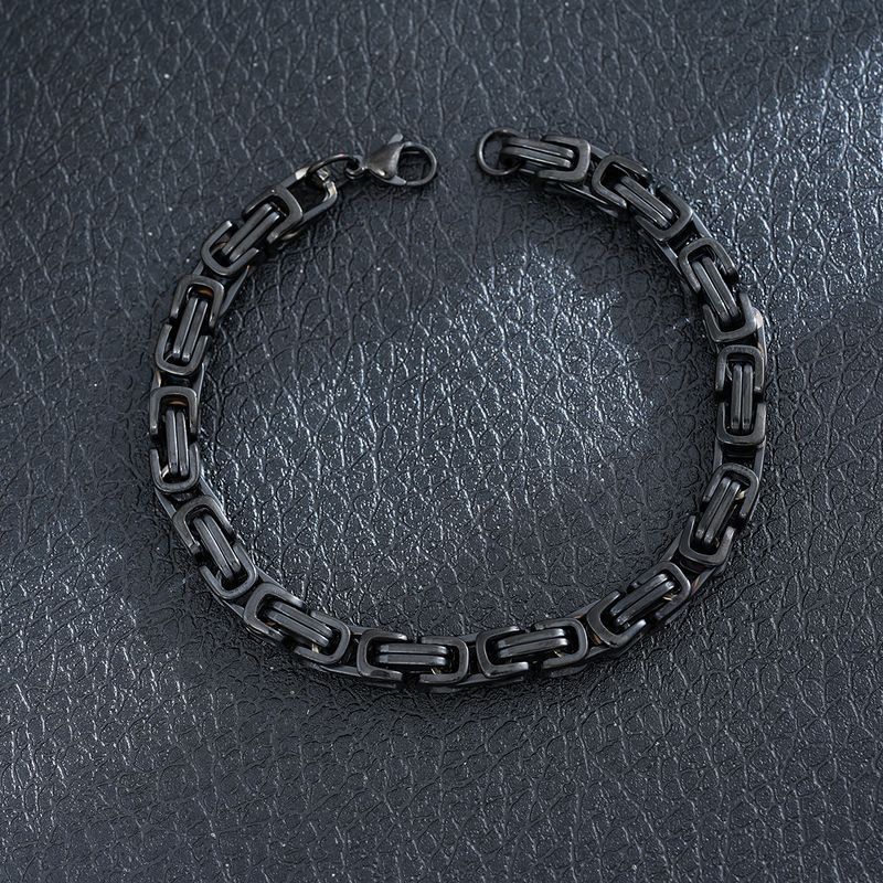 Bracciale da uomo in acciaio inossidabile NK nero con catena cubana in titanio intrecciato e chiusura a moschettone Hip Hop Trend_voghion.com