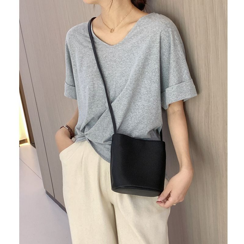 Borsa a secchiello piccola minimalista, esclusiva da donna, novità primavera/estate 2025, primo strato in pelle di vacchetta, design a tracolla alla moda_voghion.com