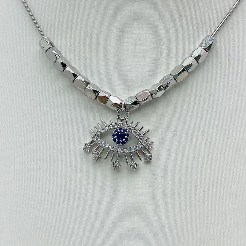 Collana con ciondolo a forma di occhi di zircone di alta qualità e catena a forma di osso, design unico e di lusso alla moda del 2022_voghion.com
