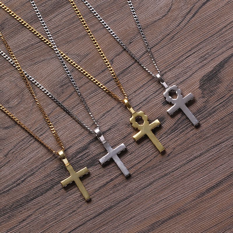 Collana con ciondolo a forma di croce bianca Ankh, simbolo della vita, in rame intarsiato con zirconi._voghion.com