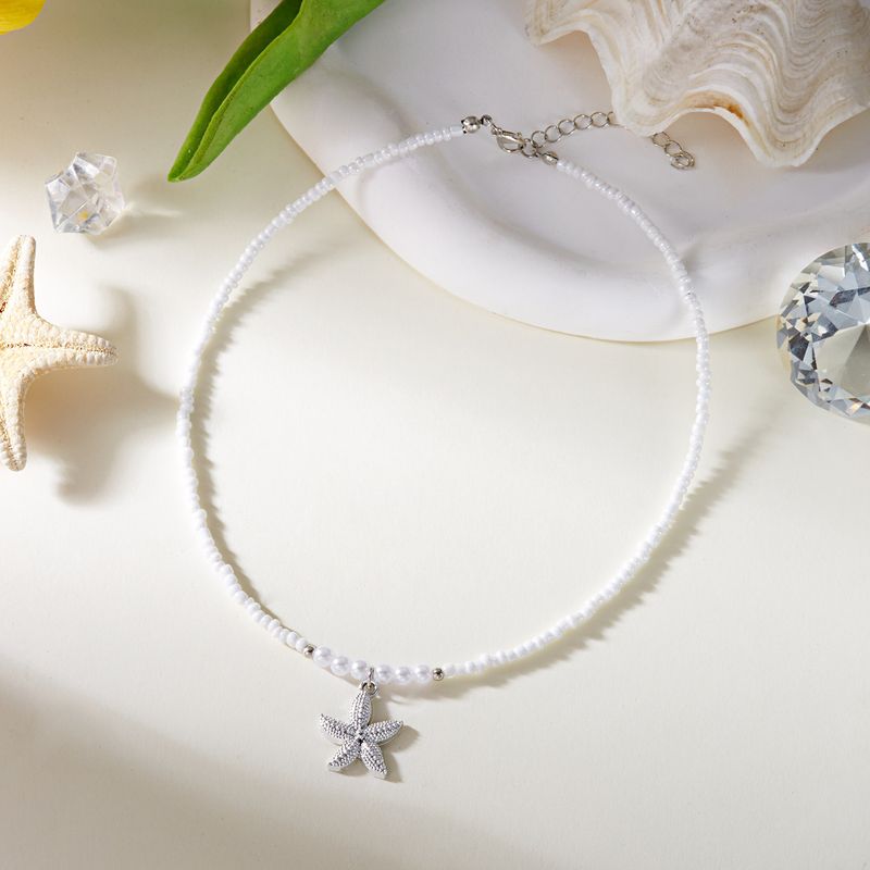 Collana girocollo con perle di riso semplici per donna, casual, versatile, da spiaggia, a forma di stella marina_voghion.com