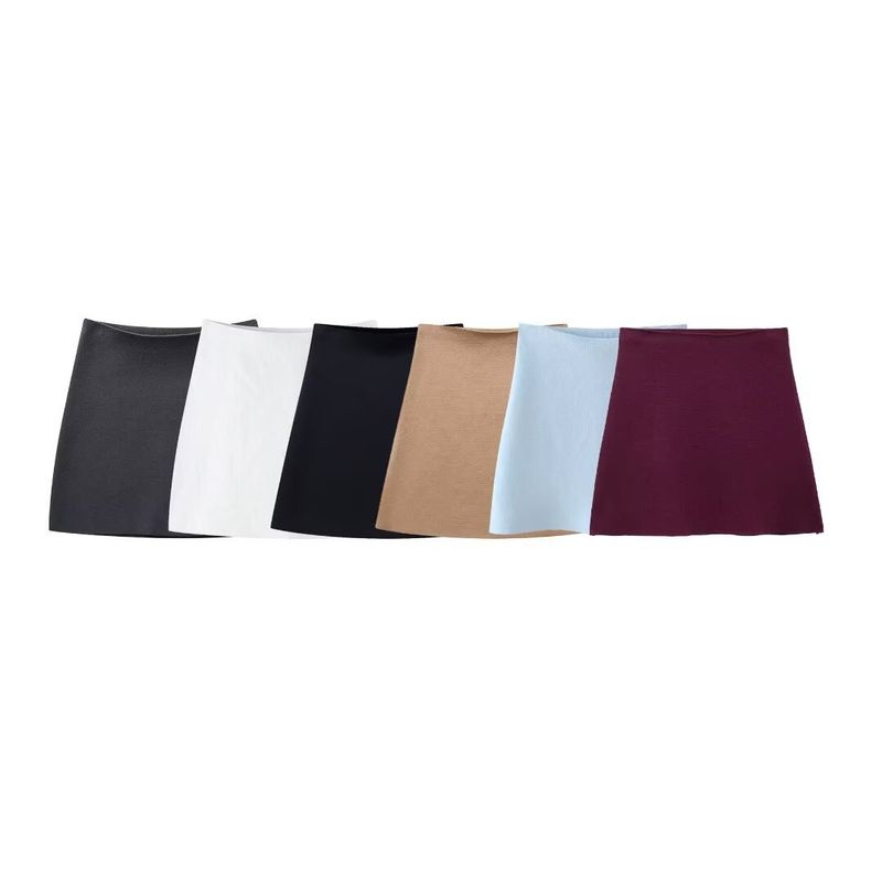Conjunto de suéter e minissaia de malha para outono e inverno - roupa casual elegante para escritório com mangas compridas e combinação de cores puras_voghion.com