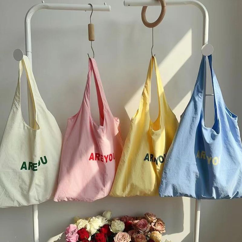 New Niche Alphabet Print Shoulder Large Capacity Designer Versatile Canvas Bag For Women Trendy Shopping Tote_voghion.com