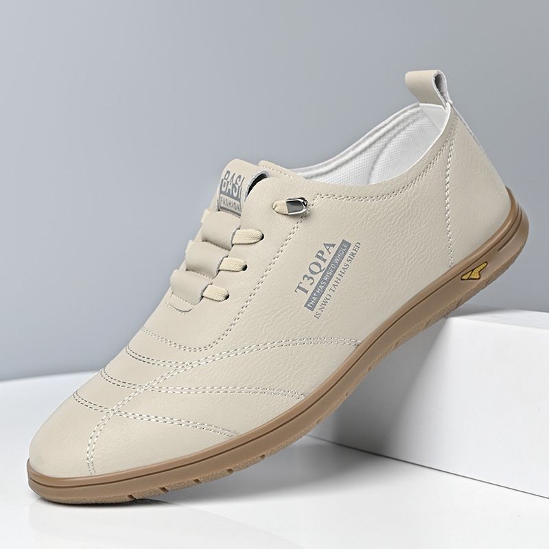 Mocassini da uomo in pelle bianca con punta arrotondata, stile casual e business_voghion.com