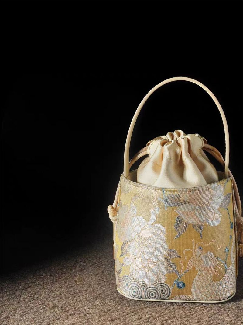 Borsa a secchiello portatile da donna in stile nazionale cinese Kirin Peony, mini 2025_voghion.com