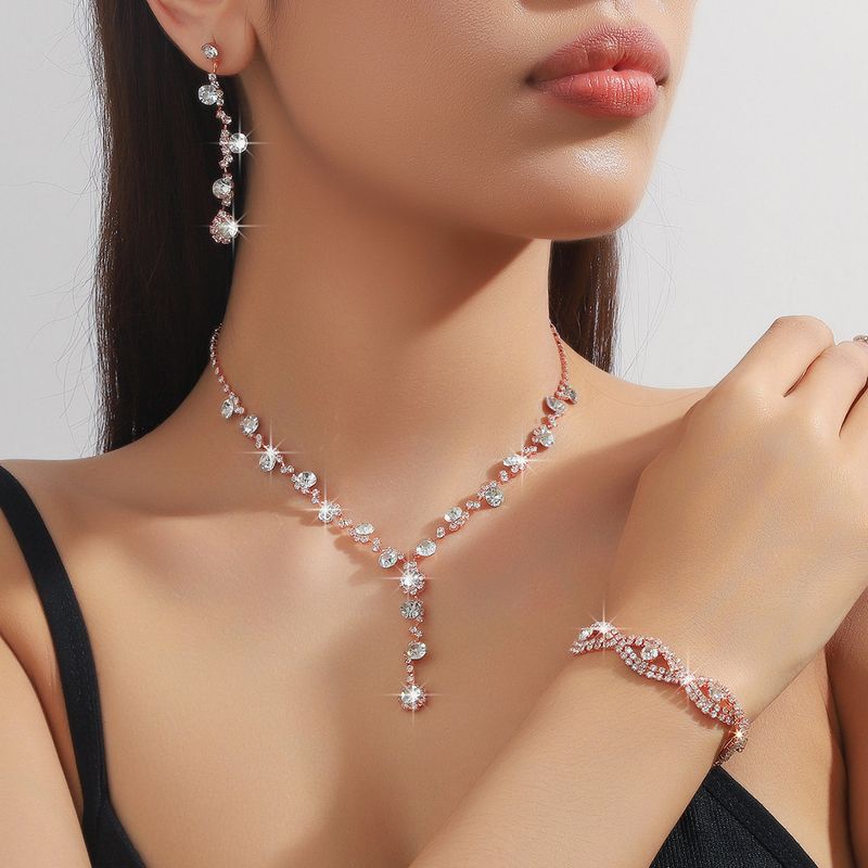 Brautset Accessoires Halskette Armband Ohrringe dreiteiliges Set Nische High-End-Schmuckset Kleid vielseitiger Schmuck_voghion.com