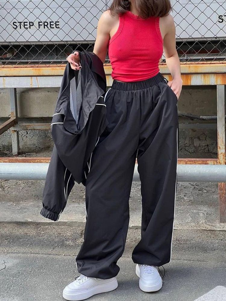 Felpa con maniche a righe alla moda da donna e set casual con cerniera e pantaloni lunghi per le donne_voghion.com