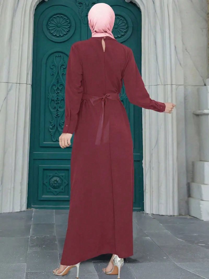 Abito lungo plissettato con cintura in vita, elegante e colorato, musulmano, da donna_voghion.com