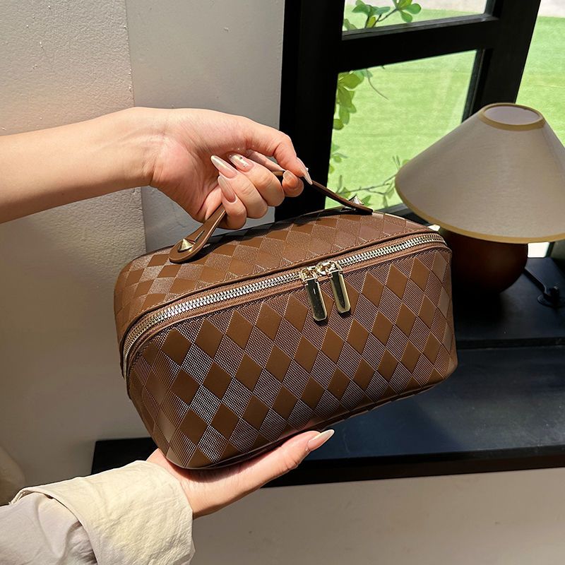 Tragbare Reise-Kosmetiktasche für Damen mit großer Kapazität, High-End-Sense-Internet-Promi, neue Aufbewahrungstasche für Reisekosmetik_voghion.com
