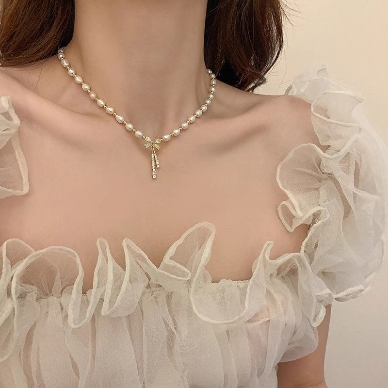 Collar de perlas con lazo para mujer, nuevo diseño moderno, ligero y lujoso, gargantilla de cadena de clavícula con temperamento de celebridad de Internet de alta gama_voghion.com