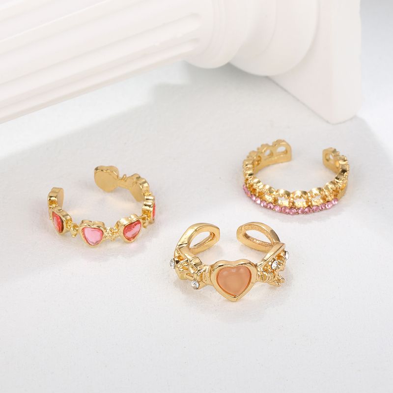 Um conjunto de anéis abertos femininos com zircônio, 3 peças_voghion.com