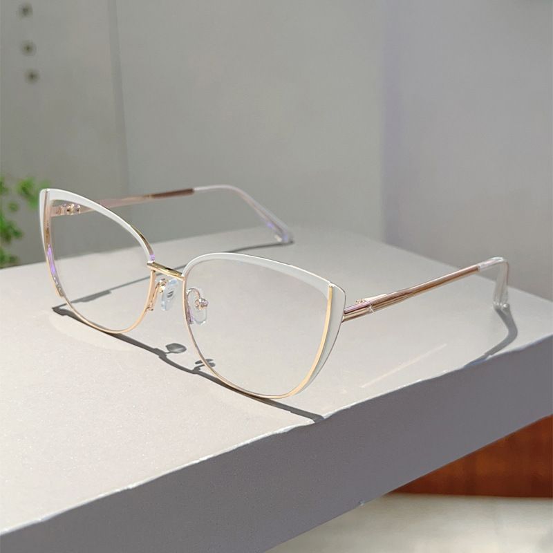 Nuovi occhiali anti luce blu con molla in metallo e montatura a occhio di gatto, semplici e versatili, lenti piatte senza gradi_voghion.com
