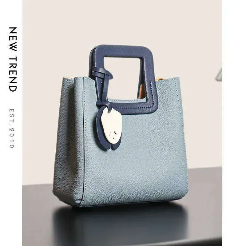 Borse Bella borsa da donna azzurra in vera pelle di mucca con manico quadrato, borsa tote casual da donna_voghion.com