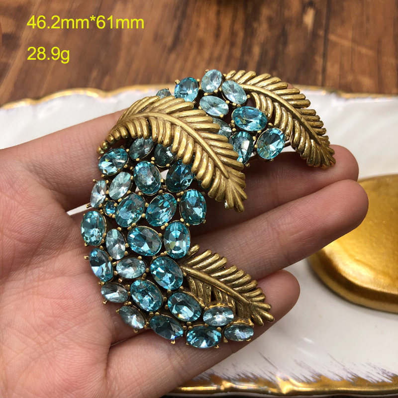Realizza spille da corsage di foglie placcate in oro e rame di alta qualità, piene di gemme blu di diamanti_voghion.com