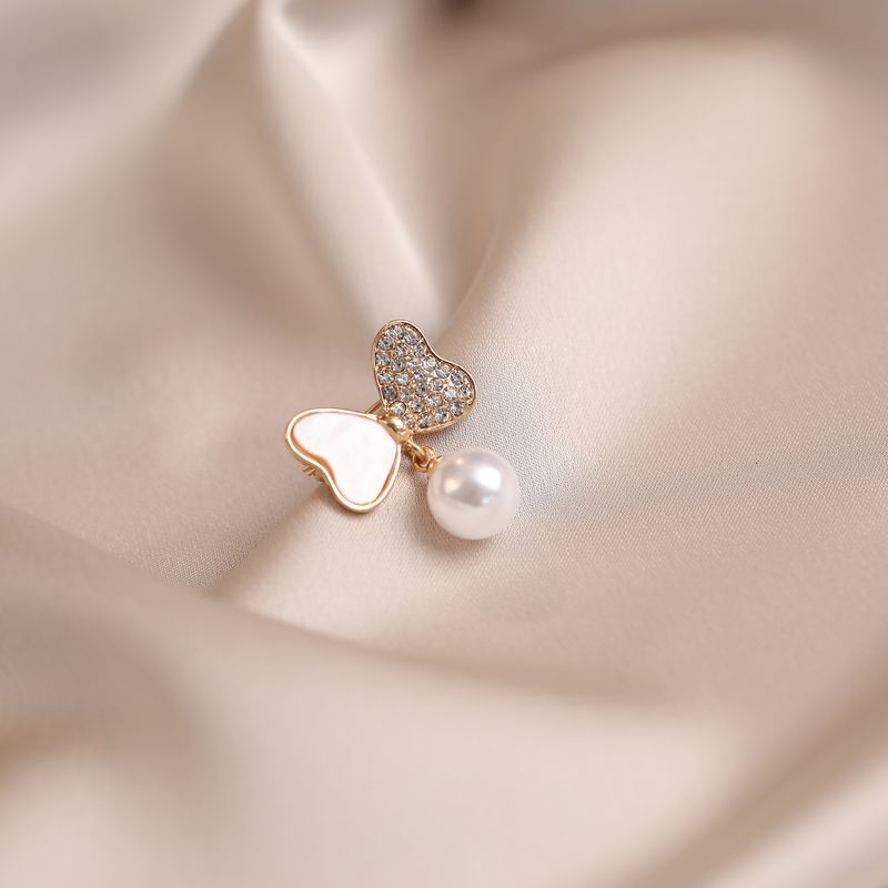 Broche de nudo de mariposa, accesorio de alta gama, diseño elegante, clip antiexposición para escote, decoración fija, alfiler para cuello._voghion.com