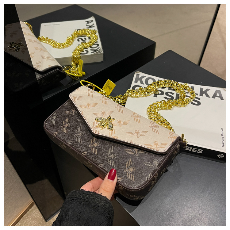 2023 nuova catena di moda singola spalla obliqua straddle piccola borsa versatile borsa a busta retrò piccola borsa quadrata marea_voghion.com