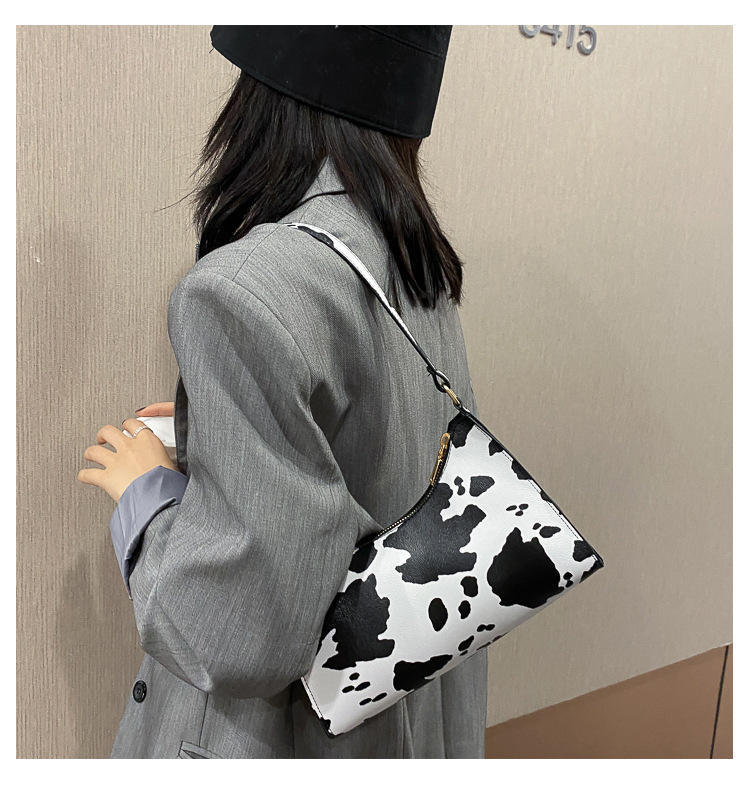 French niche design bag 2024 popular new trendy and trendy portable women's bag fashion leopard print single shoulder underarm bag_voghion.com
