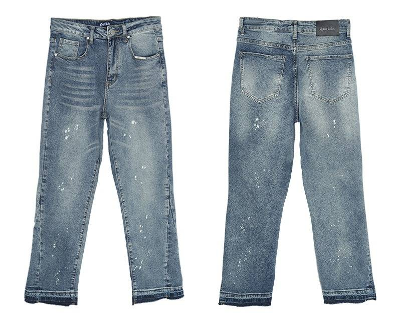 Pantaloni in denim lavato artigianale – Jeans streetwear oversize con dettagli a schizzi e usurati (S-3XL, vita media, stile utility multitasche)_voghion.com