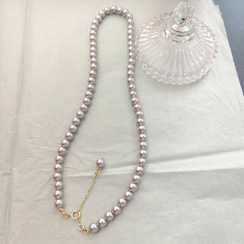 Collana con perline grigie versatili, eleganti e leggere, in oro 14k, con catena per clavicola_voghion.com