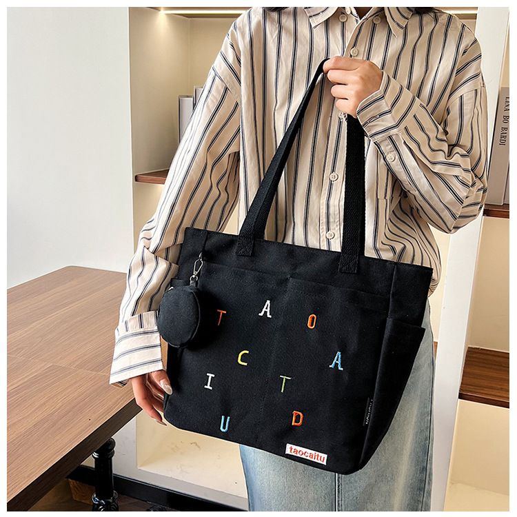 Bolso de mano de lona con letras bordadas, bolso de hombro informal para estudiantes_voghion.com