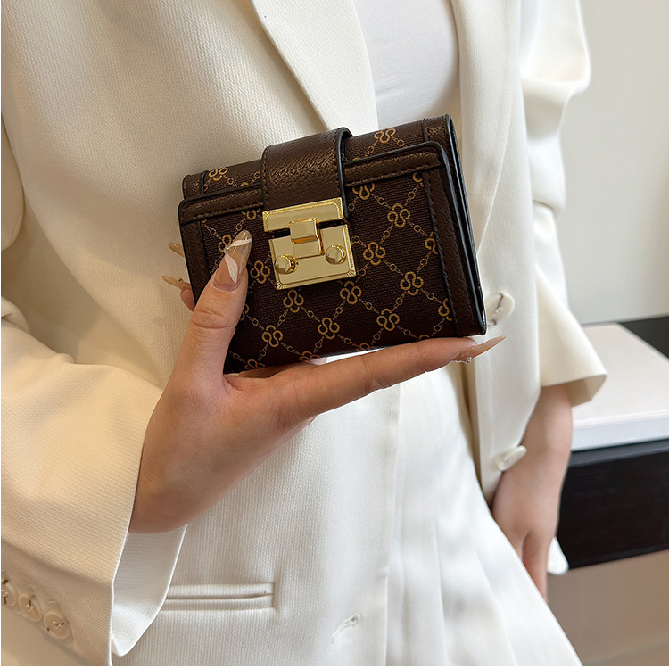 Damentaschen Geldbörse Kartenhalter Boutique Schloss Retro High-End Randdruck Dreifach gefalteter Kartenhalter mit mehreren Positionen Geldbörse mit großer Kapazität_voghion.com
