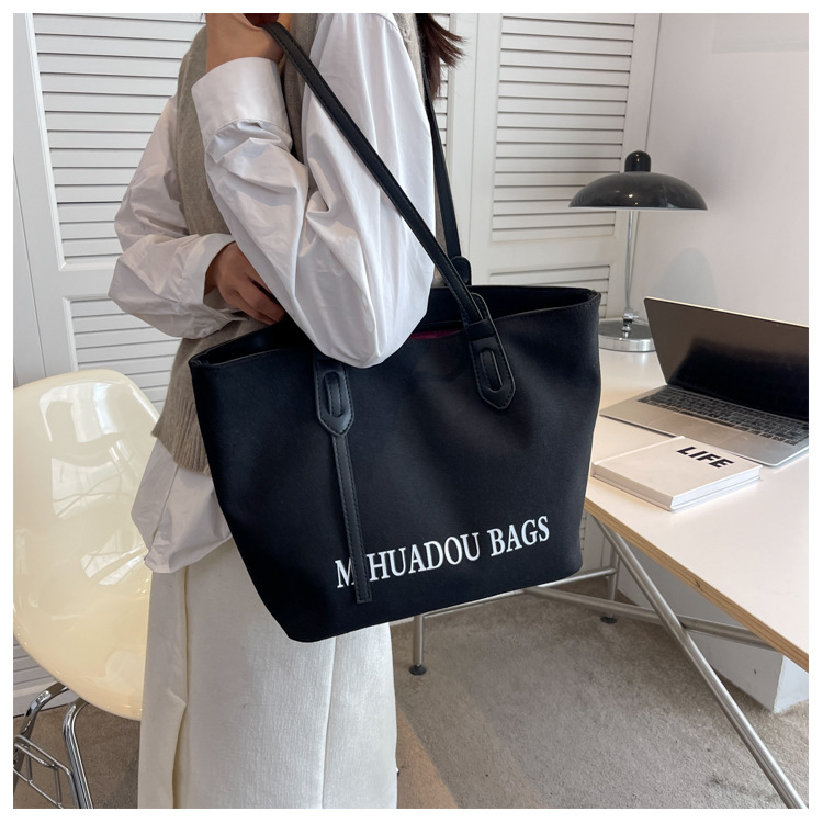 Canvas Große Damen 2023 Neue Mode Pendler Umhängetasche Einfarbig Brief Stil Urban Einfache Einkaufstasche_voghion.com