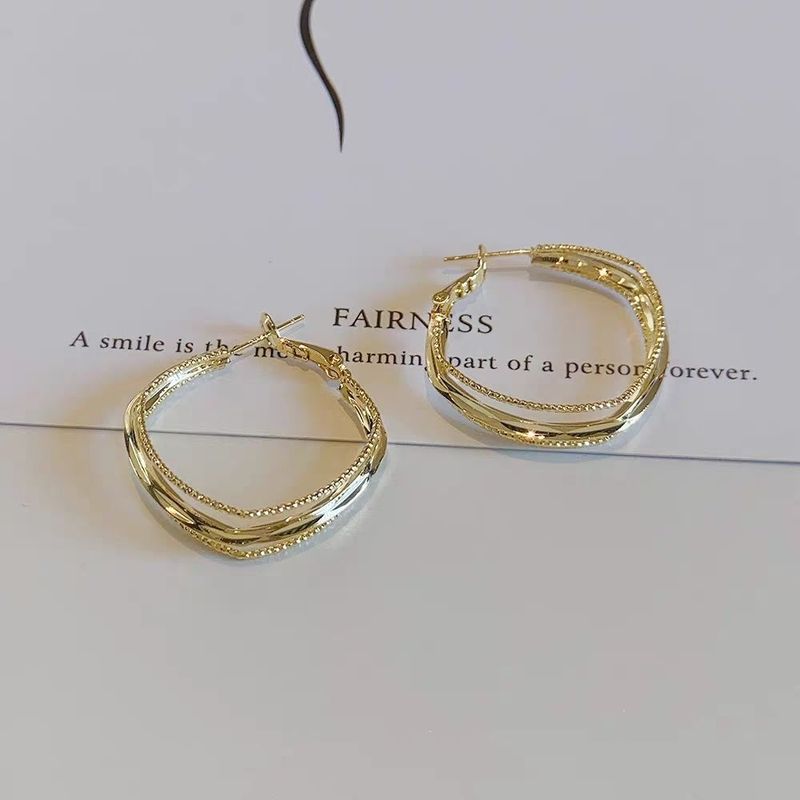 Diseño de nicho de lujo ligero minimalista, pendientes de estilo moderno de alta gama, nuevos pendientes elegantes para mujer 2023_voghion.com