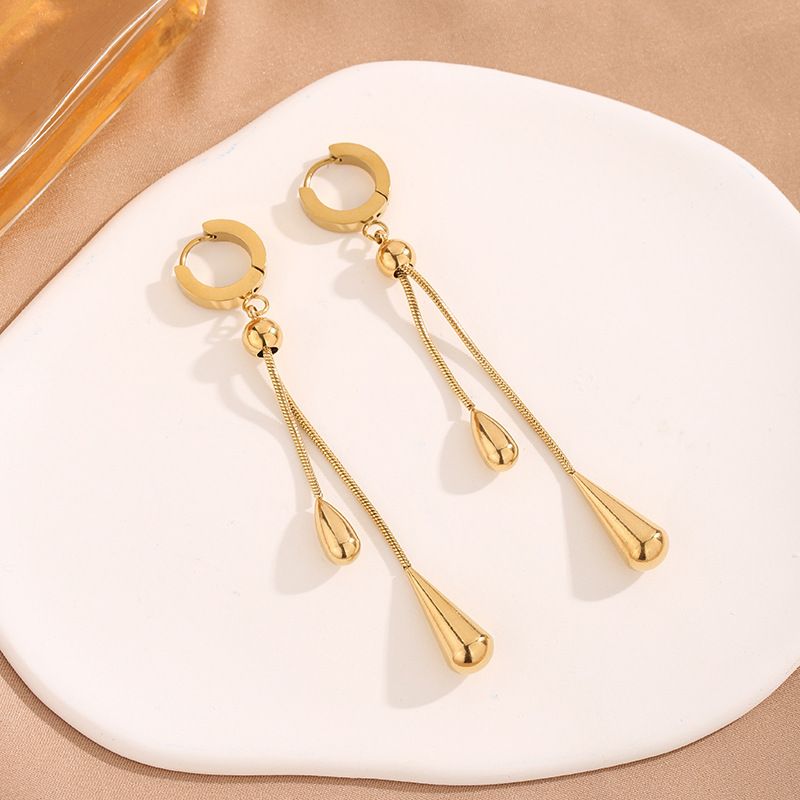 Set di orecchini con collana di nappe di lusso leggero, set di gioielli in acciaio al titanio alla moda e di fascia alta_voghion.com