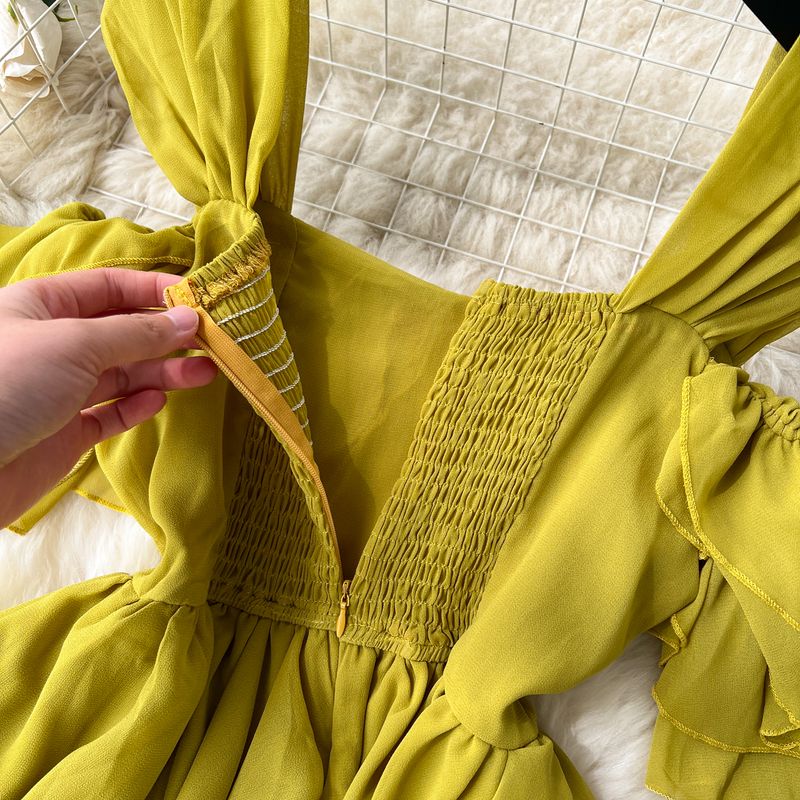 Vêtements pour femmes Costume de vacances pour femmes 2023 nouvelle chemise en mousseline de soie à bretelles à épaules dénudées à volants et pantalon large plissé drapé_voghion.com