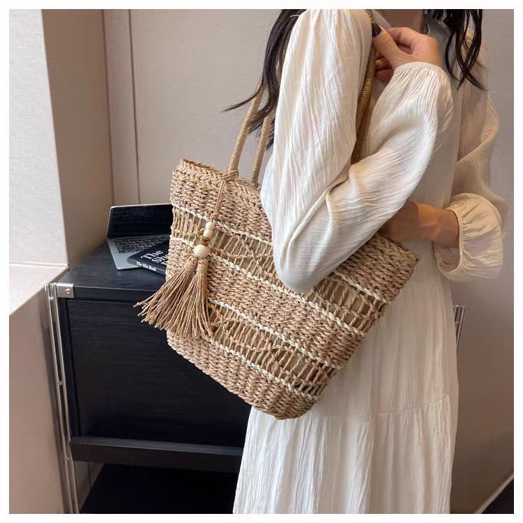 Hollow out paper rope woven bag, fashionable one shoulder grass woven bag, casual women's bag, beach bag with large capacity_voghion.com
