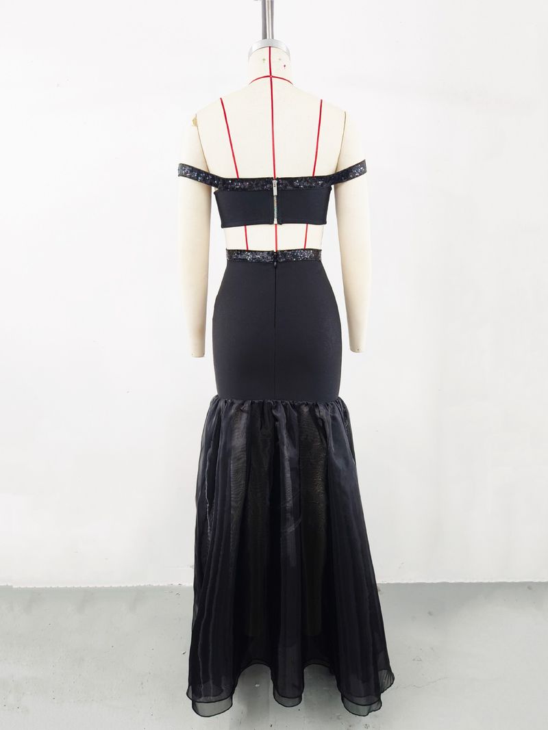 Elegante abito da sera a sirena con spalle scoperte, fasciatura, rete trasparente e vita alta per donna_voghion.com