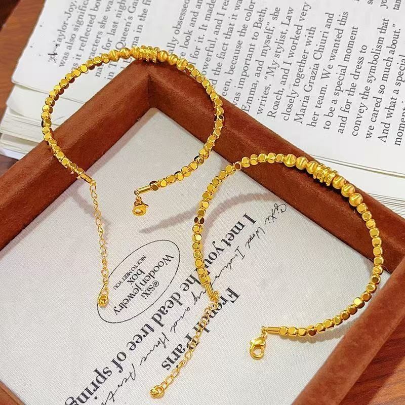 Niche High-End Gold-Plated Light Style Slim Waist Cat's Eye Gold Fragment Long-Lasting Color Bracelet Women's_voghion.com