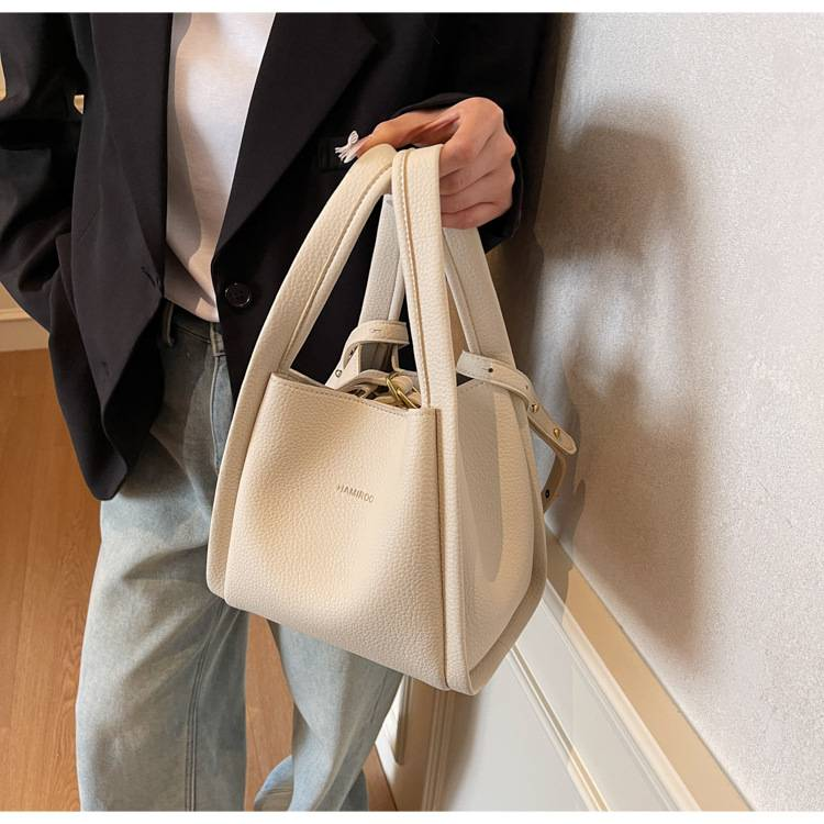 Zweiteilige, weiche Schultertasche mit Litschi-Muster für Mütter im Außenhandel. Neue, lässige, einfache, tragbare diagonale Tasche für das Leben._voghion.com