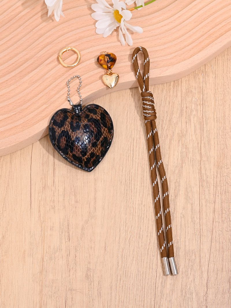 Portachiavi con cordino intrecciato a forma di cuore con stampa leopardata, versatile, alla moda, per borsa, auto, piccolo regalo._voghion.com
