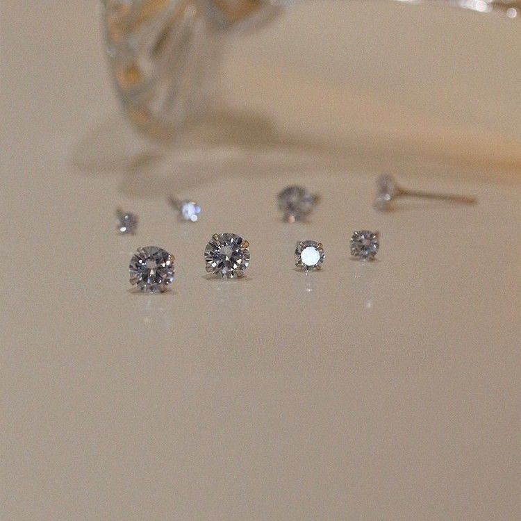 Zilveren naald eenvoudige witte strass bot oorbellen accessoires blote diamant unisex high-end nieuwe oor piercing studs_voghion.com