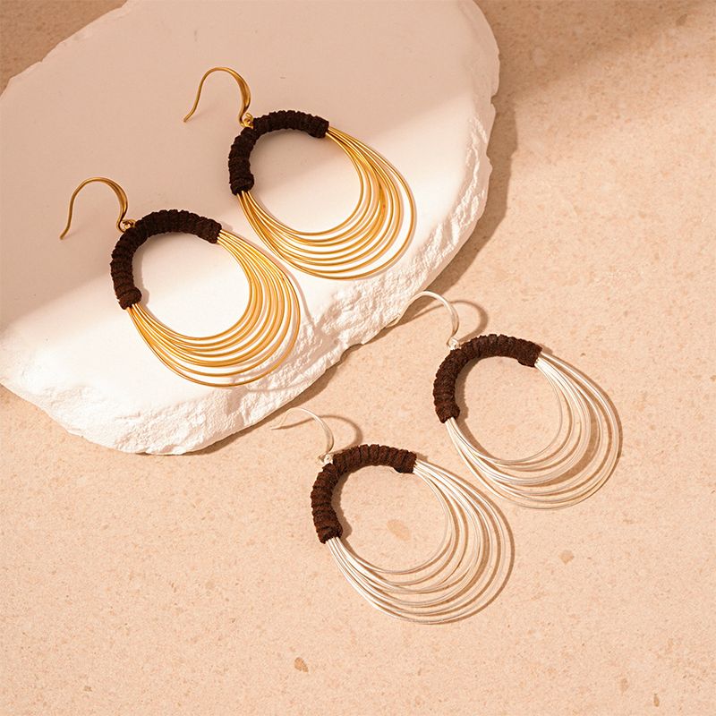 Exaggerated multi-layer circle ear hook personalized fabric winding geometric earrings_voghion.com