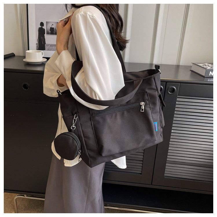 New Solid Color Canvas Bag Large Capacity Single Shoulder Bag Handheld Student Versatile Tote Bag Crossbody Bag_voghion.com