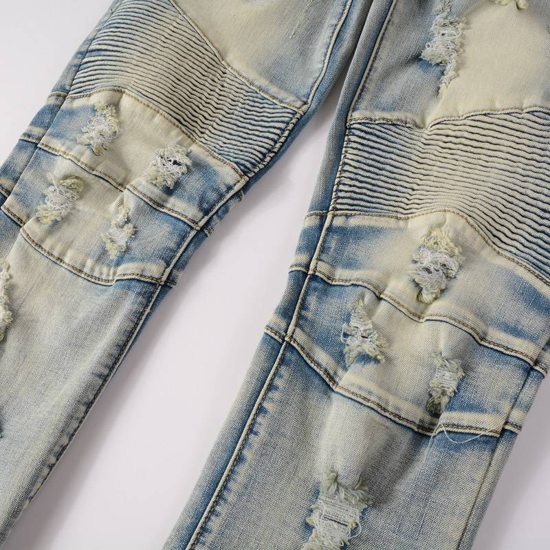 Jean bleu délavé à patchwork de mode Pantalon en denim pour hommes à poches multiples avec fermeture éclair Pantalon de motard déchiré en denim de créateur pour hommes_voghion.com
