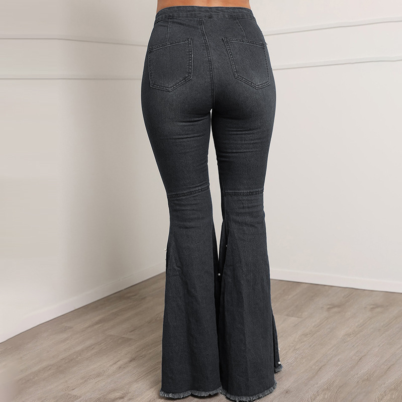 Stretch-casual jeans met uitlopende pijpen en kralen voor dames_voghion.com