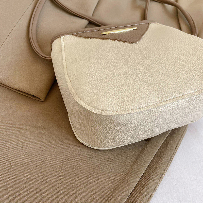 Borse a secchiello piccole e versatili alla moda per donna, estate 2023, con tracolla e texture, per mamma e bambino_voghion.com