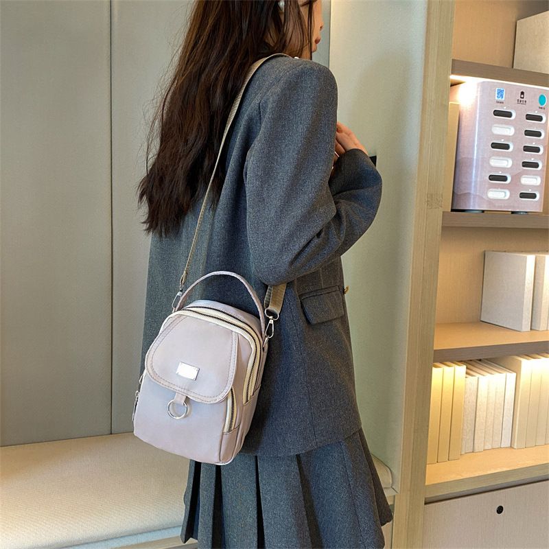 Nova mini bolsa transversal de ombro em tecido oxford fashion requintada pequena quadrada casual versátil_voghion.com