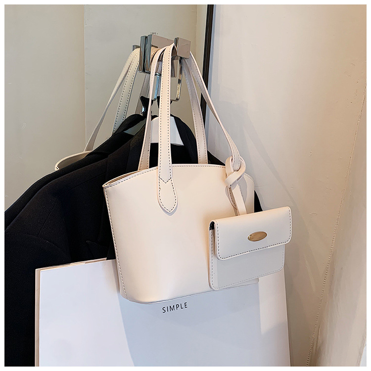 Borsa piccola portatile di moda estiva nuova borsa a secchiello casual semplice da donna 2023 borsa per ascelle suocera con trama di nicchia_voghion.com