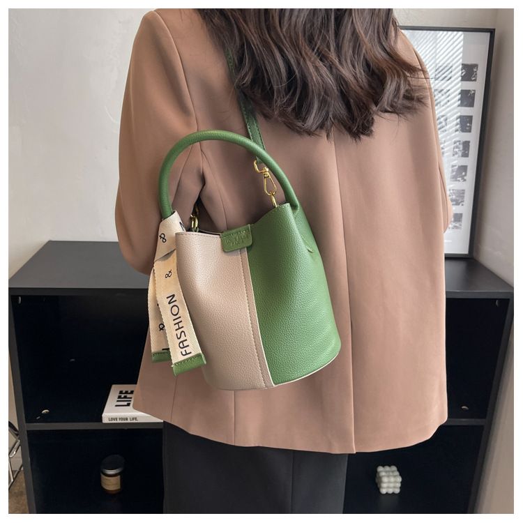 New portable bucket bag with niche design, women's color blocked crossbody bag with high aesthetic value, underarm shoulder bag_voghion.com