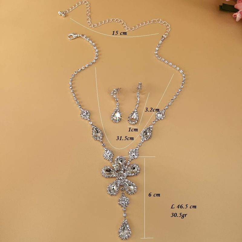 Ensemble collier et boucles d'oreilles goutte d'eau en strass pour femme - Bijoux de mariage (argent sterling 750, design élégant, collier de 45,7 cm)_voghion.com