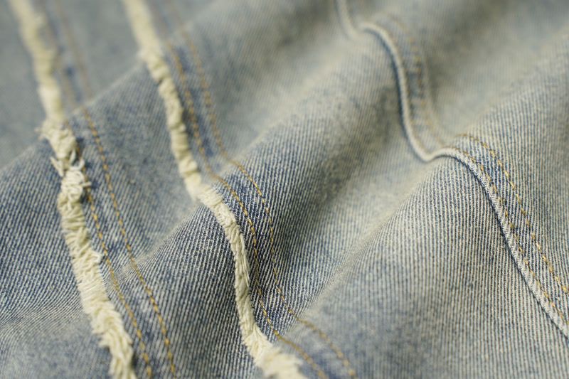 Muška odjeća Modni brend Krojenje Raw Edge Bar Design Isprane stare rupe Izlizane bijele široke nogavice High Street trend muške traperice_voghion.com