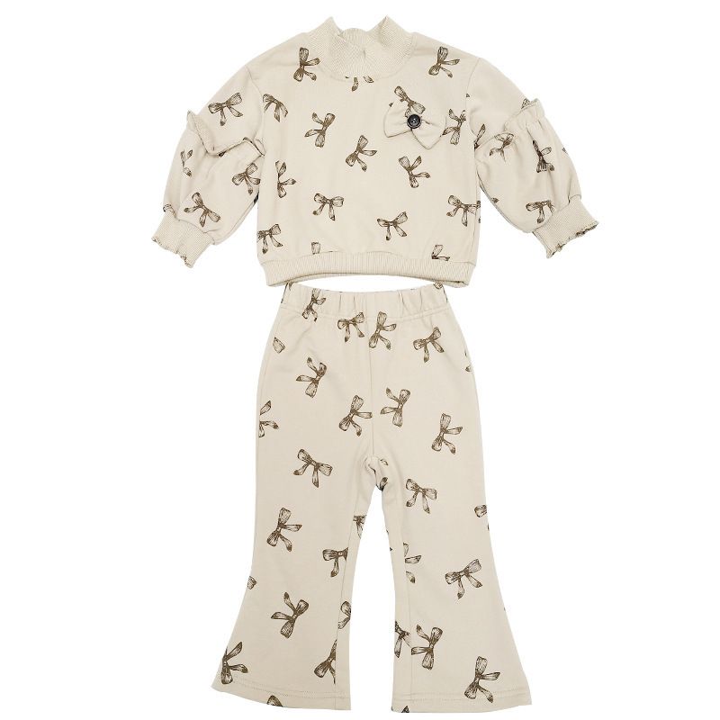 Ins Korean version girls' autumn winter new swe and stylish bow full print bubble sleeve bell bottom pants two-piece_voghion.com